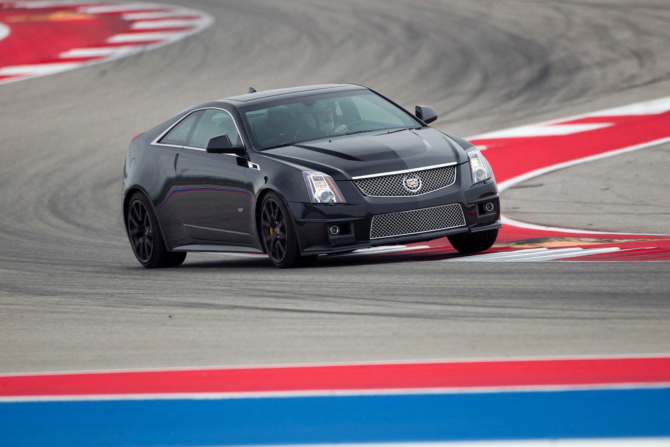 2014-Cadillac-CTS-V-Coupe-front-three-quarters-in-motion-04.jpg