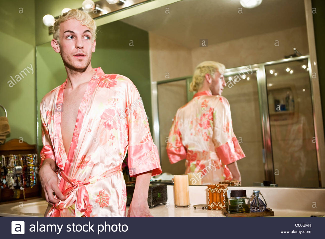 drag-queen-in-silk-robe-in-bathroom-C00BM4.jpg