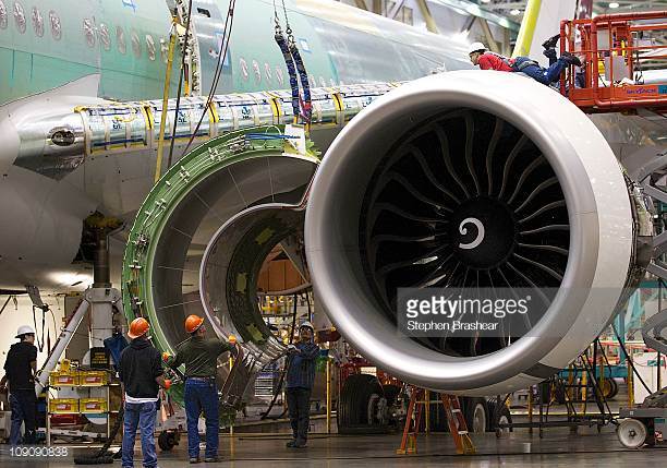 ing-employees-prepare-to-install-an-engine-cowling-on-a-boeing-777-picture-id109090838?s=612x612.jpg