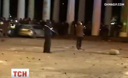 ukrainian-protestor-epic-stone-throwing-fail.gif
