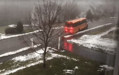 watch-bus-slides-down-icy-road-in-massachusetts-collides-with-car.gif